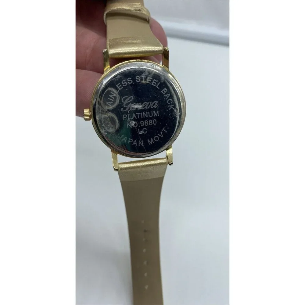 Geneva Platinum No.9880 Women's Gold Band White Face Watch w/ Gold Bowties